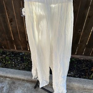 flowy cream split open wide leg pants